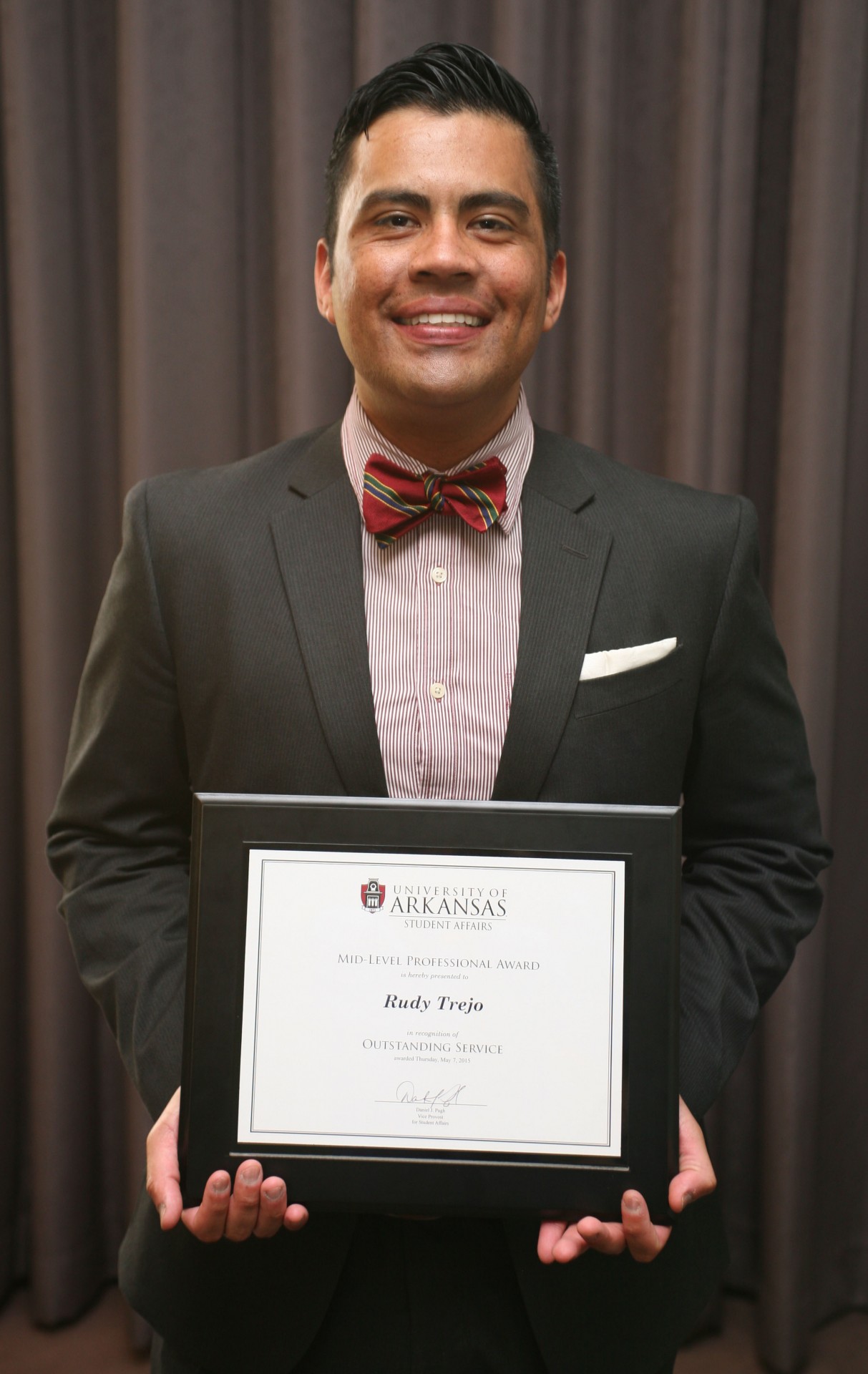 Rudy Trejo received the Outstanding Mid-Level Professional/Rising Star for 2014-2015.